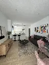 obývacia izba s kuchyňou