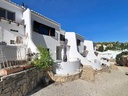 Ibizský štýlový dom v Benisse / Calpe s bazénom a tenisovým kurtom – 269 900 €